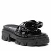 Mules Et Sandales Mules / Sandales De Bain CARINII - B7223 070-000-000-E49 Noir